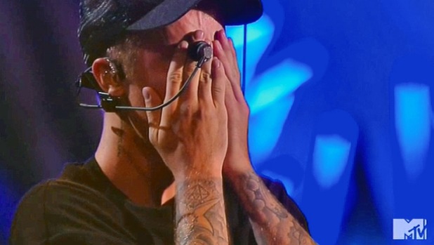 Emotional... Bieber breaks down after his performance at the VMAs