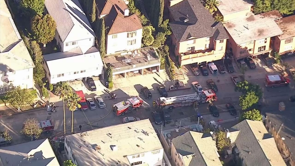 Fire engines are shown at the scene of an apartment fire in Westwood on Monday Sept. 21 2015