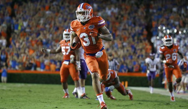 Sep 12 2015 Gainesville FL USA Florida Gators defensive back Jalen Tabor intercepts the ball and runs it back for a touchdown against the East Carolina Pirates during the second half at Ben Hill Griffin Stadium. Florida Gators defeated the Eas