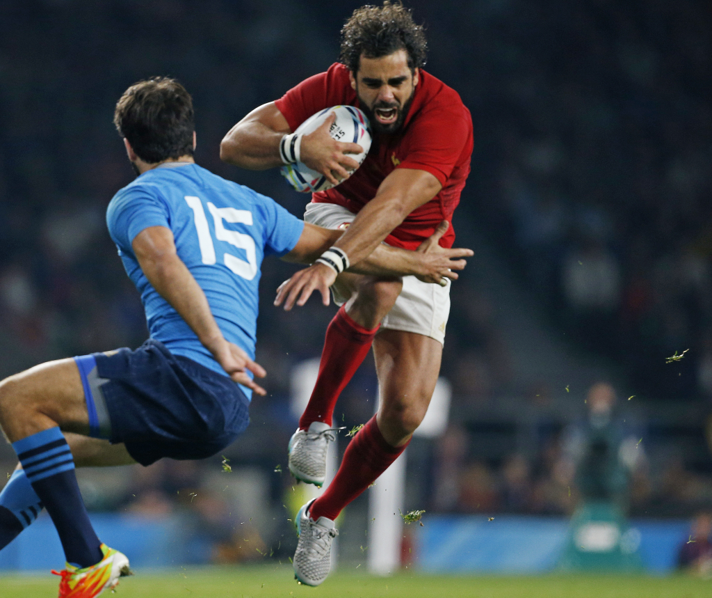 French winger Yoann Huget in the action which saw him sustain a knee injury which has ruled him out of the Rugby World Cup