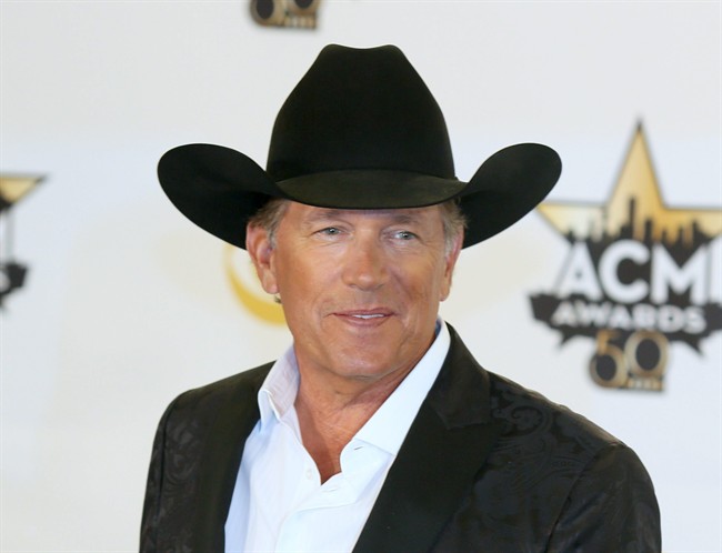 George Strait poses in the press room with the milestone award at the 50th annual Academy of Country Music Awards in Arlington Texas. Strait announced on Tuesday Sept. 22 that he’s releasing a new album “C