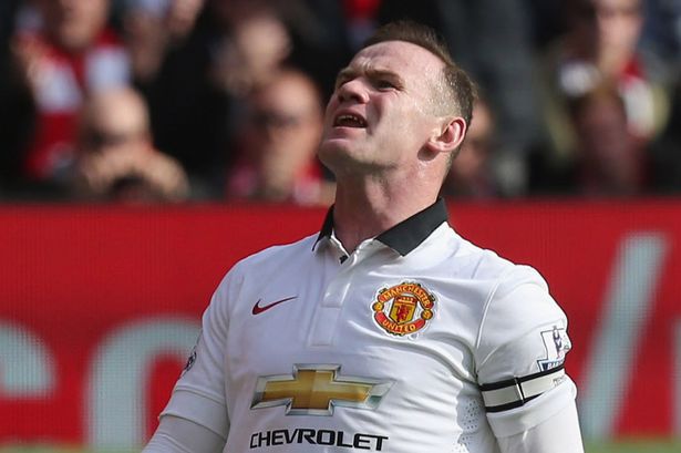 Wayne Rooney of Manchester United reacts to missing a penalty against Liverpool