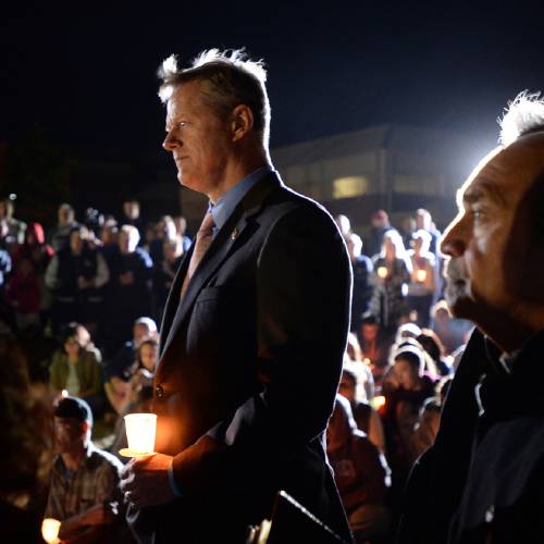 Gov. Charlie Baker attends a candlelight vigil for Bella Bond on Deer Island in Boston. With the identification of'Baby Doe as 2-year-old Bella Bond Baker finds himself again thrust into the sadly fami