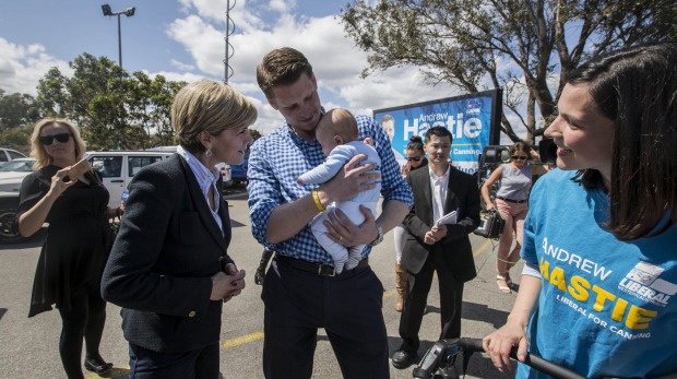 Andrew Hastie with his son Jonathon wife Ruth and Deputy Prime Minister Julie Bishop at the Serpentine Jarrahdale Recreation Centre polling place