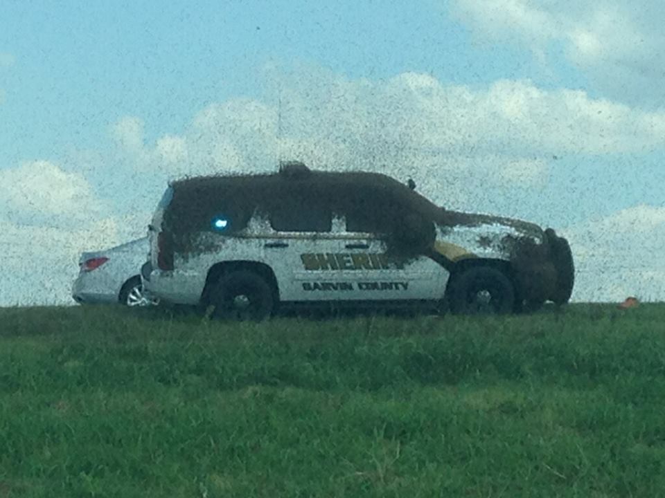 SUV after a big-rig carrying honey bees overturned on Sept. 29 2015