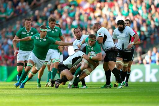 Ireland's Jamie Heaslip is tackled during the Rugby World Cup match at Wembley Stadium London. David Davies  PA Wire