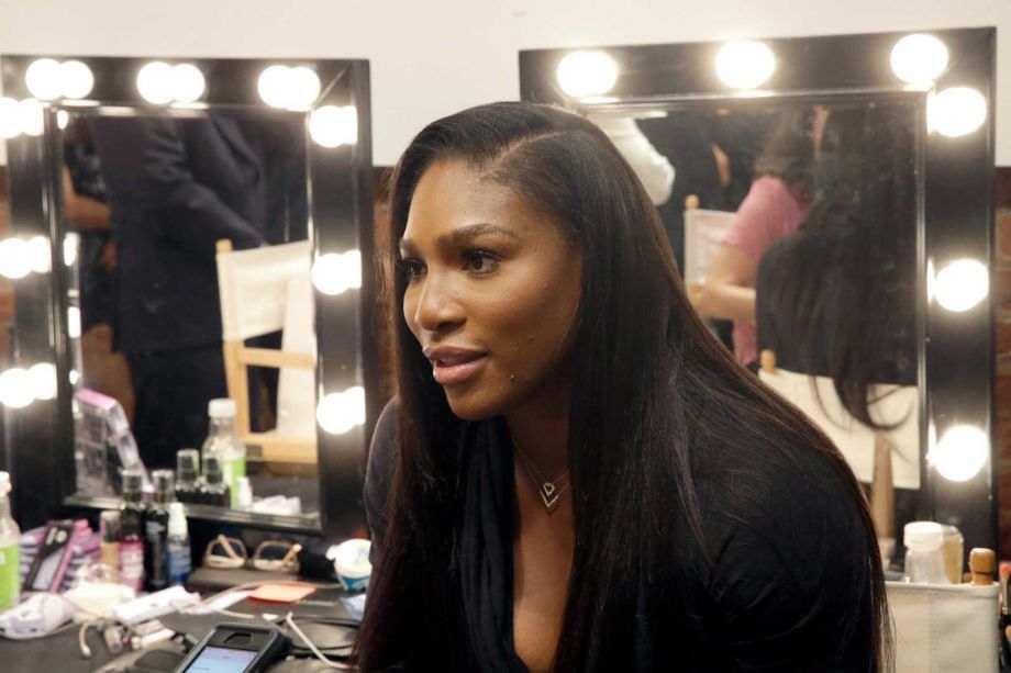 Serena Williams speaks to reporters backstage after she presented her Spring 2016 collection during Fashion Week in New York Tuesday Sept. 15 2015