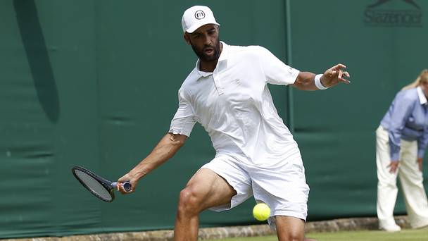 James Blake in action at Wimbledon in 2013