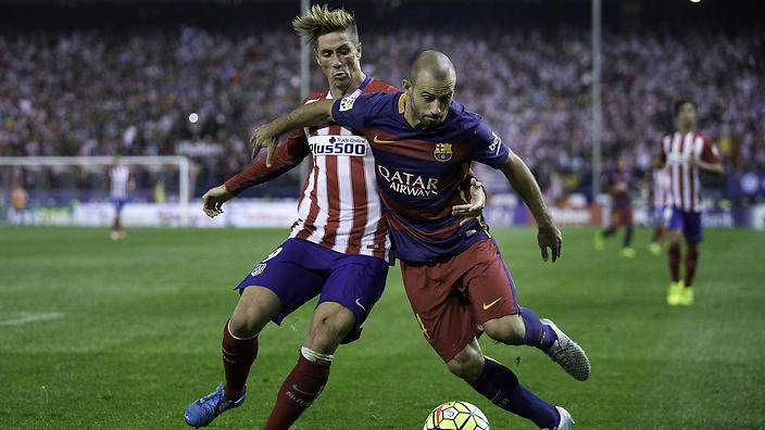 Javier Mascherano holds off Fernando Torres. 
    
    
                
          
          Show Grid