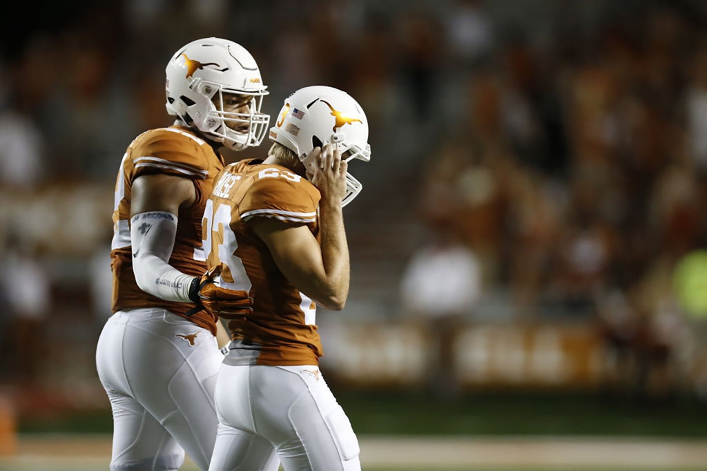 Texas place kicker Nick Rose hangs his head after missing the extra point to put Texas within a point to tie Cal Sept. 19 2015 at Darrell K. Royal Memorial Stadium in Austin TX. Cal went on to win 45-44. JAY JANNER  AMERICAN-STATESMAN