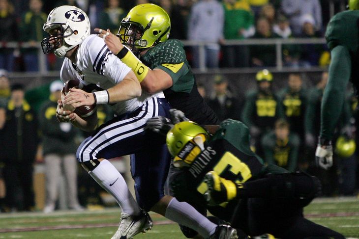 John Beck is tackled by Oregon defenders in the 2006 Las Vegas Bowl- Ethan Miller  Getty Images