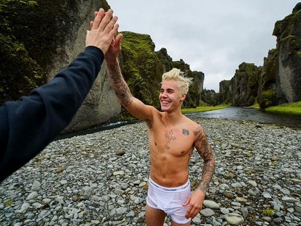 Justin Bieber Dips Into A Glacier In Iceland Wearing White CK Briefs