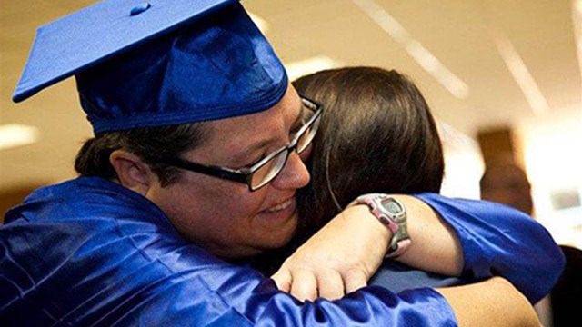 Kelly Gissendaner hugs her daughter Kayla as she celebrates her graduation from a prison theology program in 2011. Emory Univ