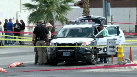 Las Vegas police searching for man after officer shot with high-powered firearm