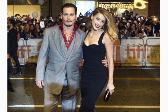 Actors Johnny Depp and his wife Amber Heard arrive for the premiere of'Black Mass at TIFF the Toronto International Film Festival iMonday. Their second TIFF film London Fields has been pulled from its Friday premiere