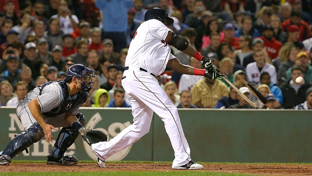 David Ortiz #34 of the Boston Red Sox breaks his bat as he flys out in the third inning against the Tampa Bay Rays at Fenway Park