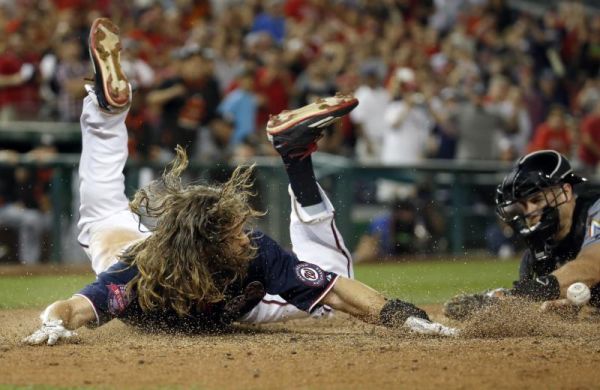 Washington Nationals Jayson Werth scores the winning run