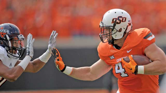 No. 25 Oklahoma State forces 7 turnovers, beats UTSA 69-14