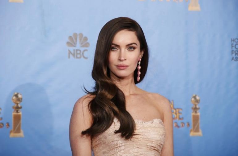 Presenter Megan Fox poses backstage at the 70th annual Golden Globe Awards in Beverly Hills California