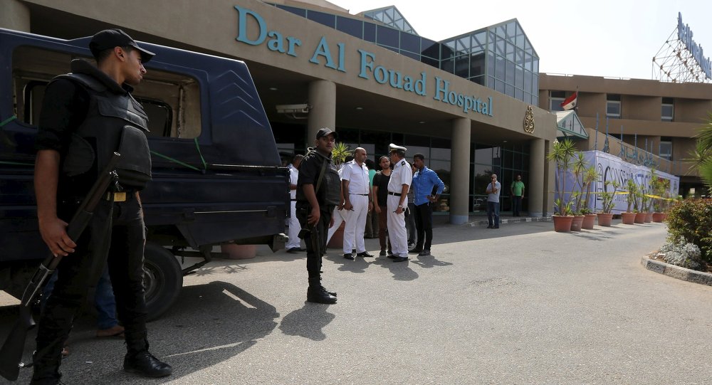 Egyptian police personnel stand guard outside Dar Al Fouad Hospital where injured tourists who were mistakenly targeted in a military operation chasing terrorist elements are recovering in Cairo Egypt