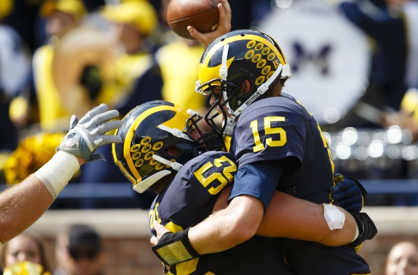 Michigan wide receiver Amara Darboh makes a one-handed catch in the first quarter of an NCAA college football game against BYU in Ann Arbor Mich. Saturday Sept. 26 2015