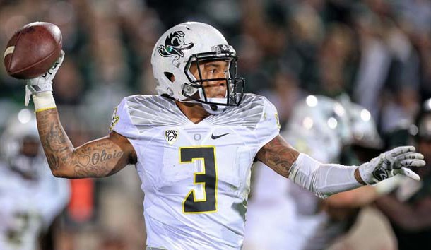 Sep 12 2015 East Lansing MI USA Oregon Ducks quarterback Vernon Adams Jr. attempts to throw the ball against the Michigan State Spartans during the 2nd half of a game at Spartan Stadium. MSU won 31-28. Mandatory Credit Mike Carter-USA TODAY Spor