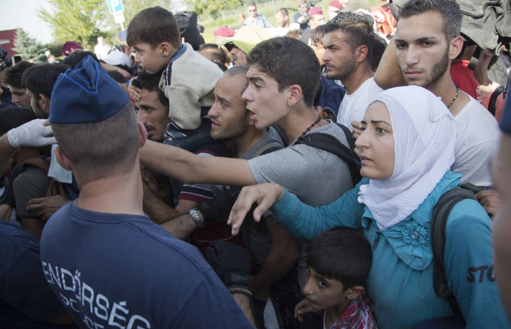 EU rebukes Hungary as refugee crisis tensions escalate