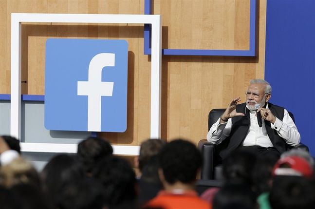 Prime Minister of India Narendra Modi speaks at Facebook in Menlo Park Calif. Sunday Sept. 27 2015. A rare visit by Modi this weekend has captivated his extensive fan club in the area and commanded the attention of major U.S. technology companies eage