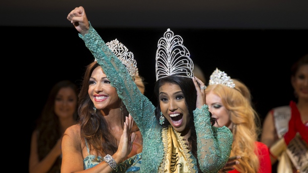 Ashley Burnham of Canada pumps her fist in the air as she wins the