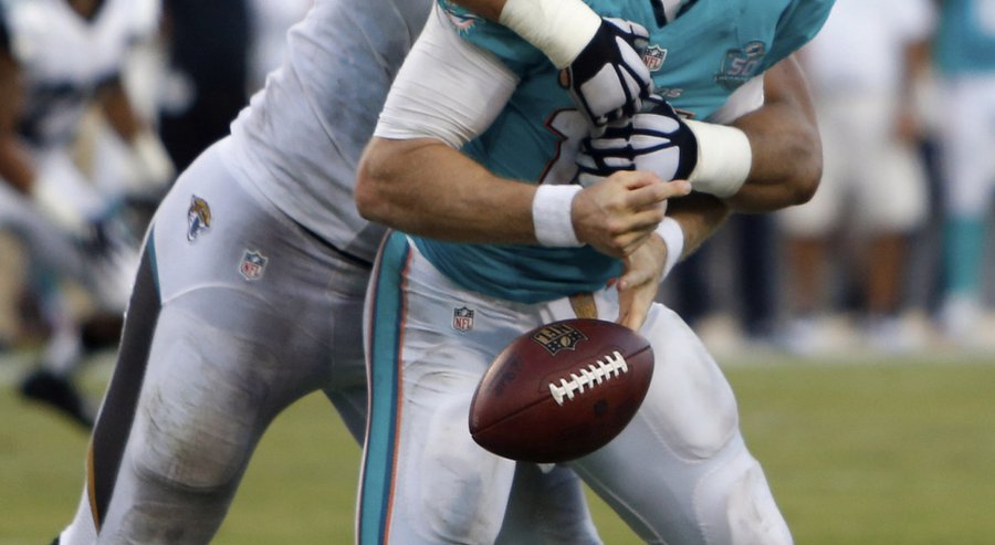 Jacksonville Jaguars defensive end Jared Odrick left sacks Miami Dolphins quarterback Ryan Tannehill causing a fumble during the second half of an NFL football game in Jacksonville Fla. Sunday Sept. 20 2015. Jacksonville won 23-20. (AP