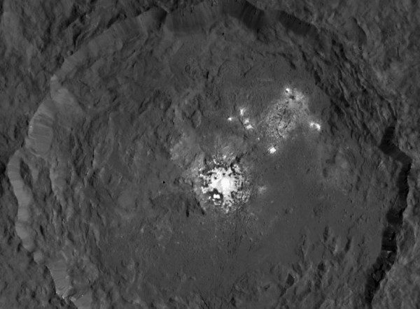 View larger. | Occator crater on Ceres home to what's now seen as a collection of intriguing bright spots. Image via NASA  JPL-Caltech  UCLA  MPS  DLR  IDA