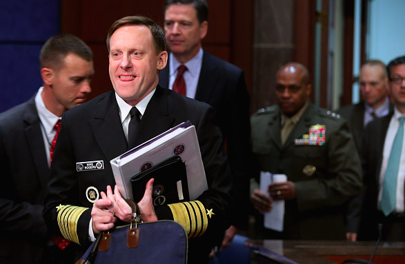 National Security Agency Director Adm. Michael Rogers FBI Director James Comey and Defense Intelligence Agency Director Lt. Gen. Vincent Stewart arrive before testifying about'World Wide Cyber Threats during an open hearing of the House Intell