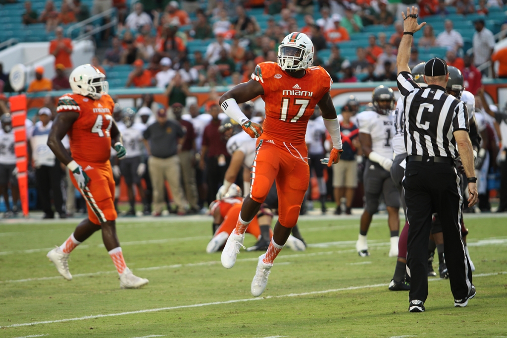 Senior linebacker Tyriq Mc Cord celebrates a good play during UM's opener against Bethune-Cookman. Mc Cord says'There's no more hype than usual' with regard to this weekend's game against Nebraska. Hallee Meltzer