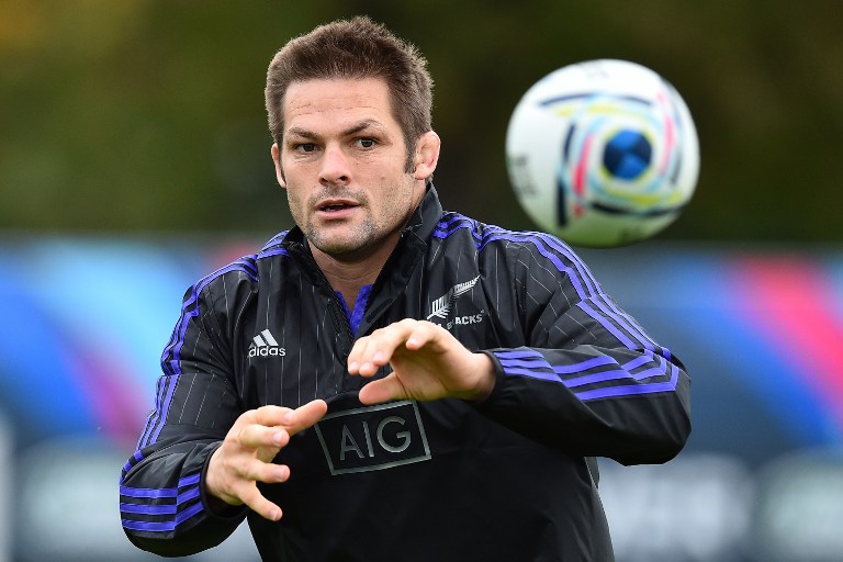 New Zealand All Blacks flanker and captain Richie Mc Caw catches the ball during a training session at the Lensbury Hotel