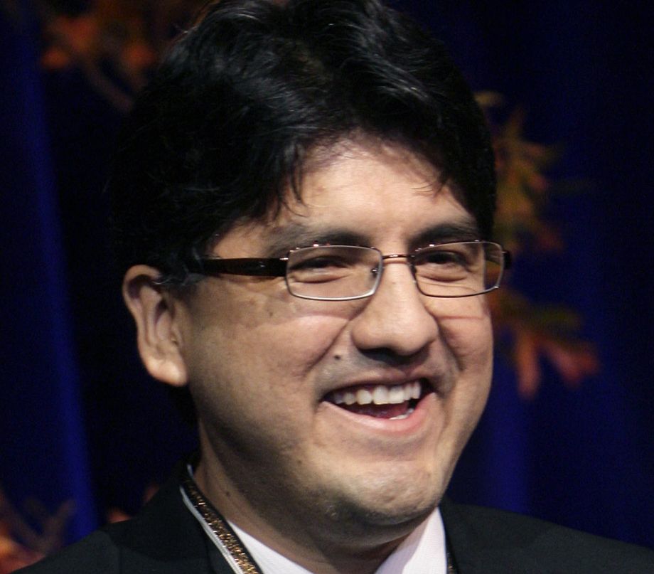 Sherman Alexie smiles at the 58th National Book Awards in New York. Alexie is defending his decision to include a poem by a white man writing under a Chinese pen name in the “Best American Poetry” anthology