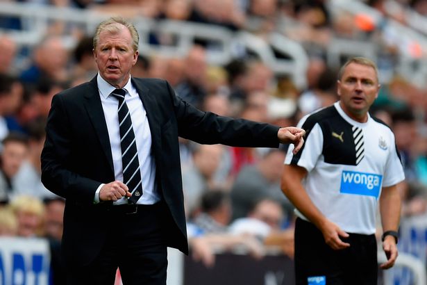 Newcastle United head coach Steve Mc Claren signals as coach Paul Simpson looks