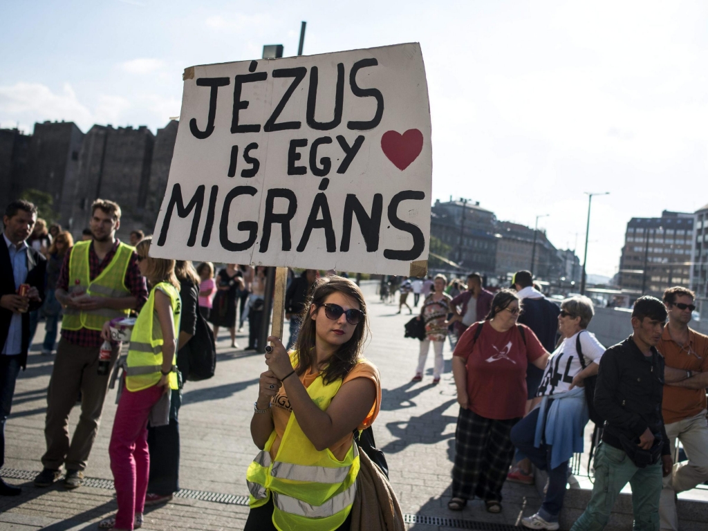 People taking part in a demonstration in support of migrants called the 'Solidarity Day&#039 gather at the Keleti railway station in Budapest Hungary on Saturday