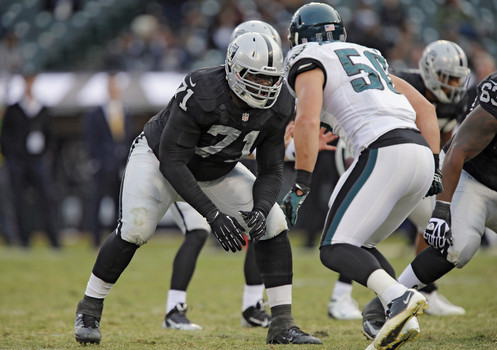 Tackle Menelik Watson #71 of the Oakland Raiders prepares to block linebacker Casey Matthews #50 of the Philadelphia Eagles in the fourth quarter