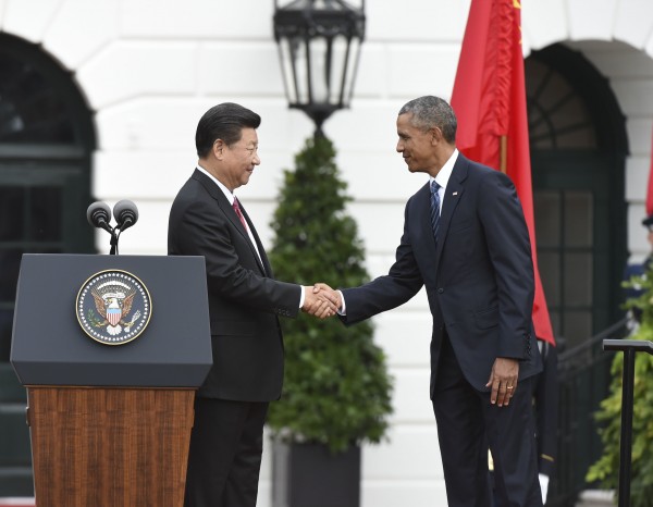 Obama and Xi sometimes sparring partners agreed to work together to end cyber crimes and espionage during a press conference at the White House