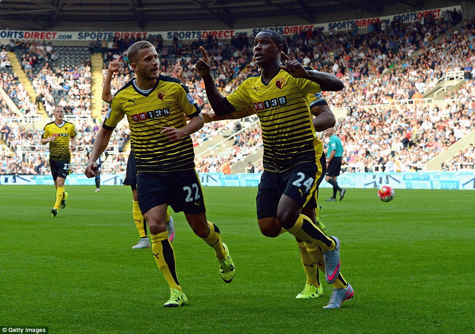 Odion Ighlao wheels away in celebration after giving Watford the lead at St James Park