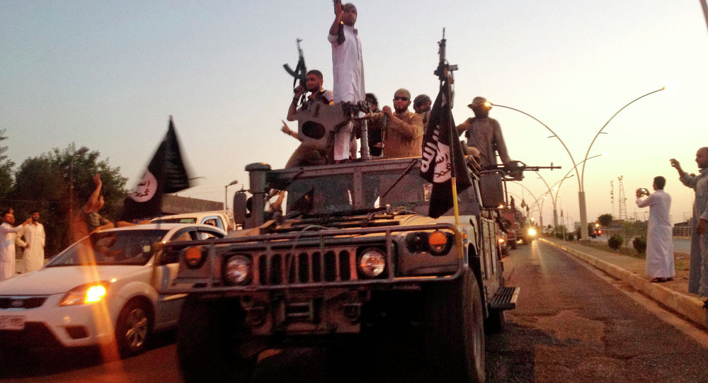 23 2014 fighters from the Islamic State group parade in a commandeered Iraqi security forces armored vehicle down a main road at the northern city of Mosul Iraq