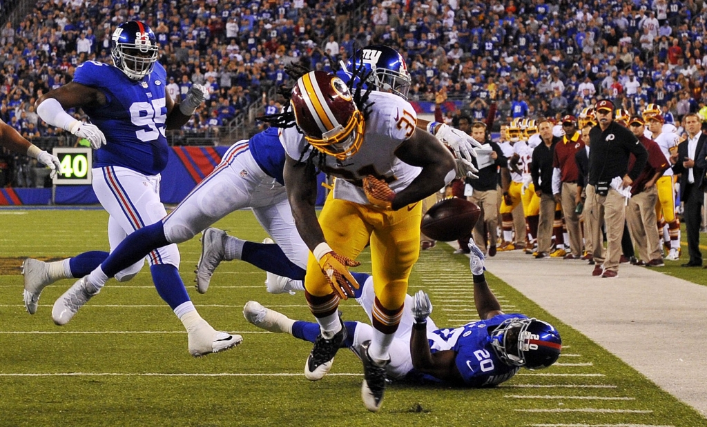 Giants topple Washington to ease pressure following 0-2 start