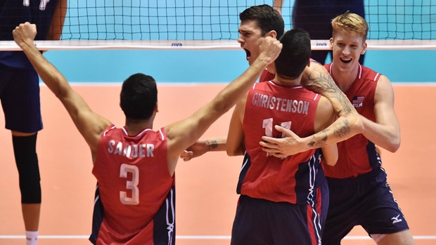 U.S. players celebrate during their win over Argentina in Tokyo which gave the Americans their first men's volleyball World Cup title in 30 years and a berth in the Rio Olympics