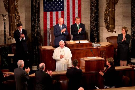 Pope Francis listens to applause before addressing a joint meeting of Congress on Capitol Hill in Washington