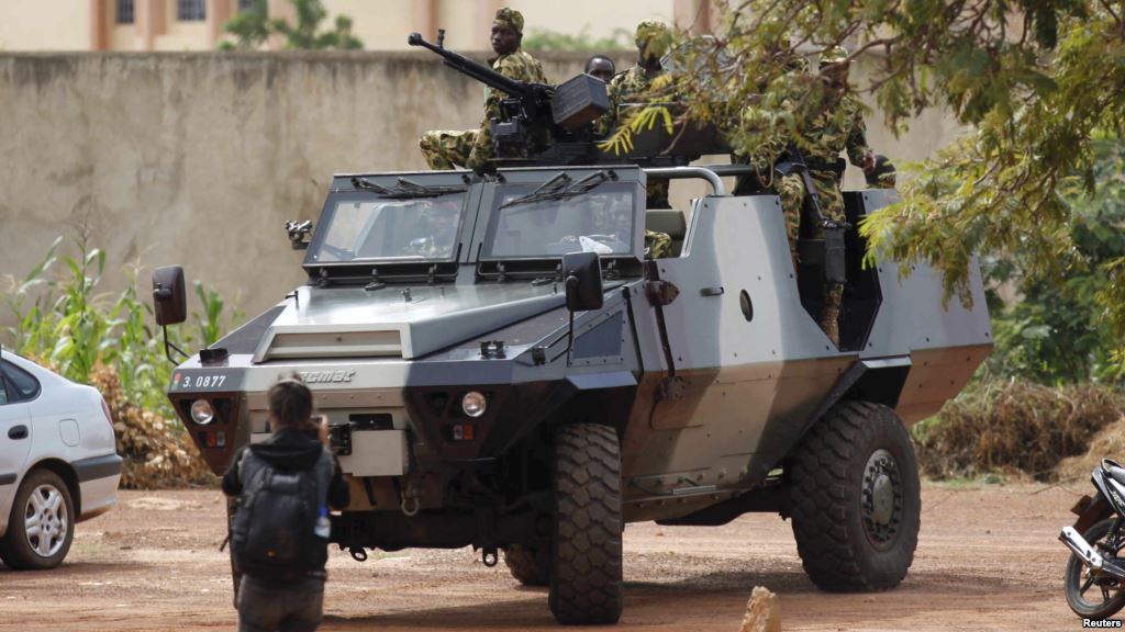 Presidential guard soldiers are seen on an armored vehicle at Laico hotel in Ouagadougou Burkina Faso Sept. 20 2015