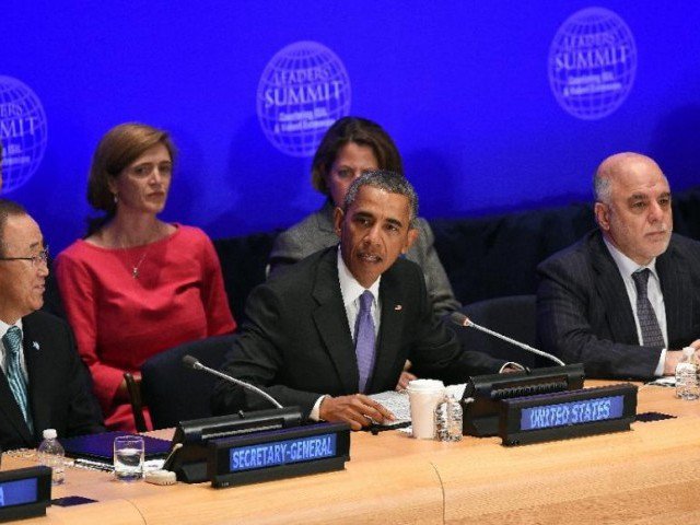 US President Barack Obama speaks as Iraq's Prime Minister Haider al Abadi and United Nations Secretary General Ban Ki-moon look on during the Leaders&#039 Summit on Countering IS at the United Nations