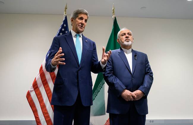 US Secretary of State John Kerry left speaks during a meeting with Iranian Foreign Minister Mohammad Javad Zarif at United Nations headquarters Saturday Sept. 26 2015