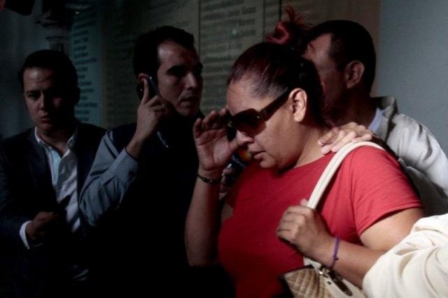 Gabriela Bejarano sister of Rafael one of the eight Mexicans killed in an incident in Egypt leaves the Government Palace after a meeting with local officials in Guadalajara