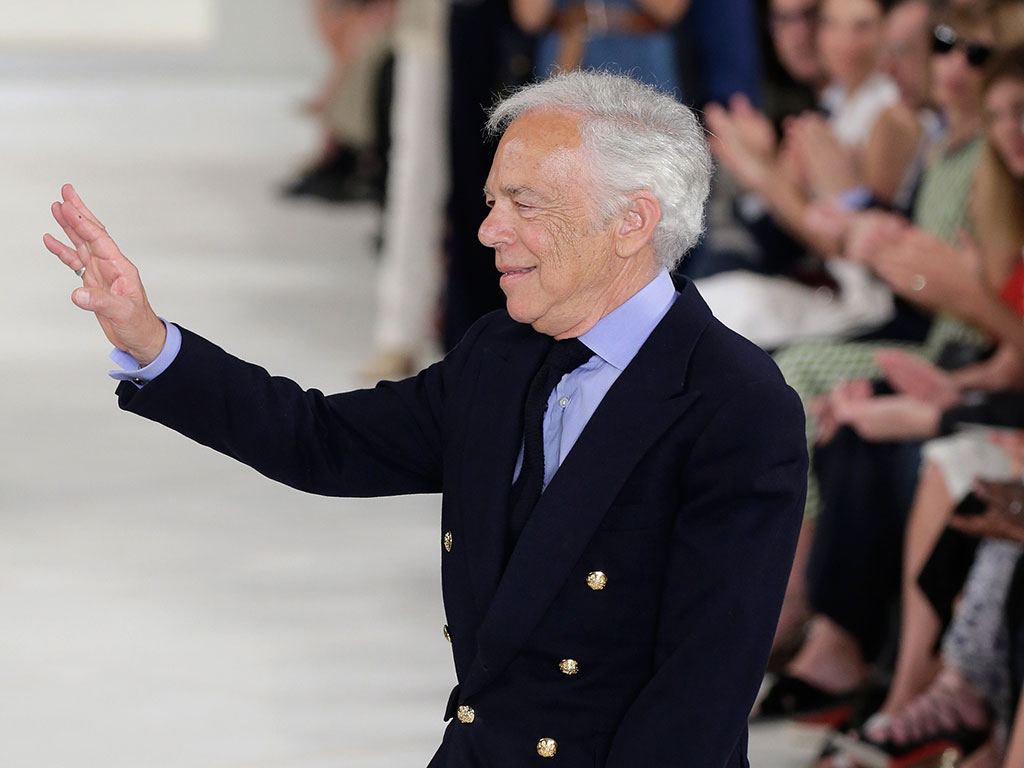 Designer Ralph Lauren right poses in his office with Stefan Larsson global brand president for Old Navy Tuesday Sept. 29 2015 in New York