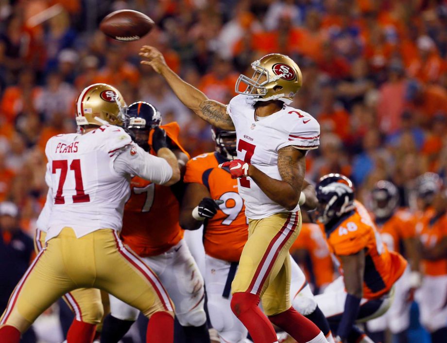 San Francisco 49ers quarterback Colin Kaepernick throws against the Denver Broncos during the first half of an NFL preseason football game Saturday Aug. 29 2015 in Denver